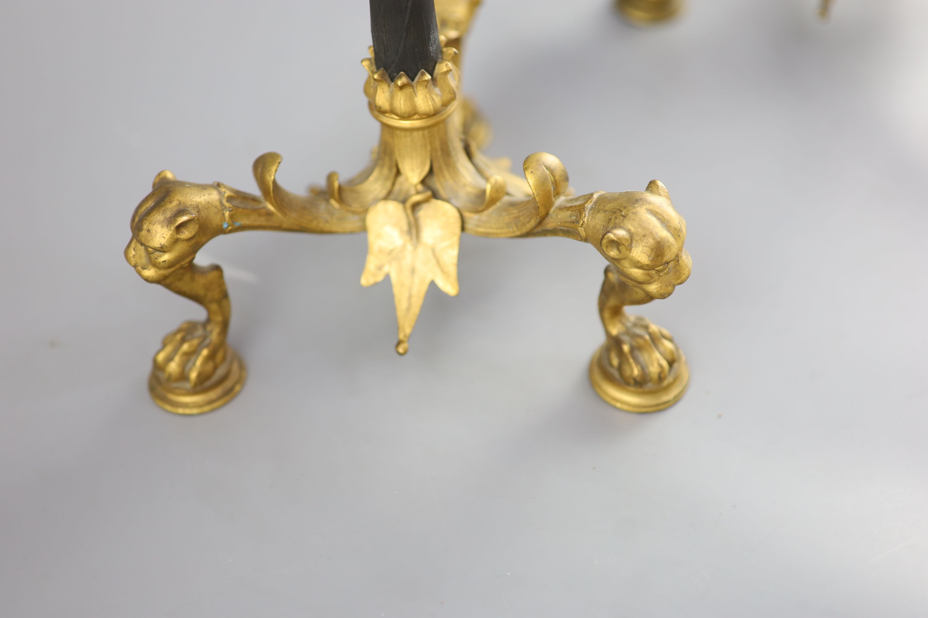 A pair of Barbedienne style five branch ormolu candelabra, 19th century, 52cm high